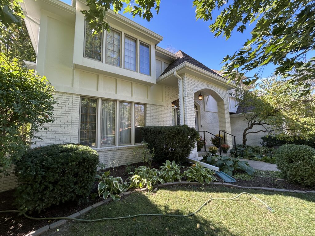 Residential exterior painting project on an older home