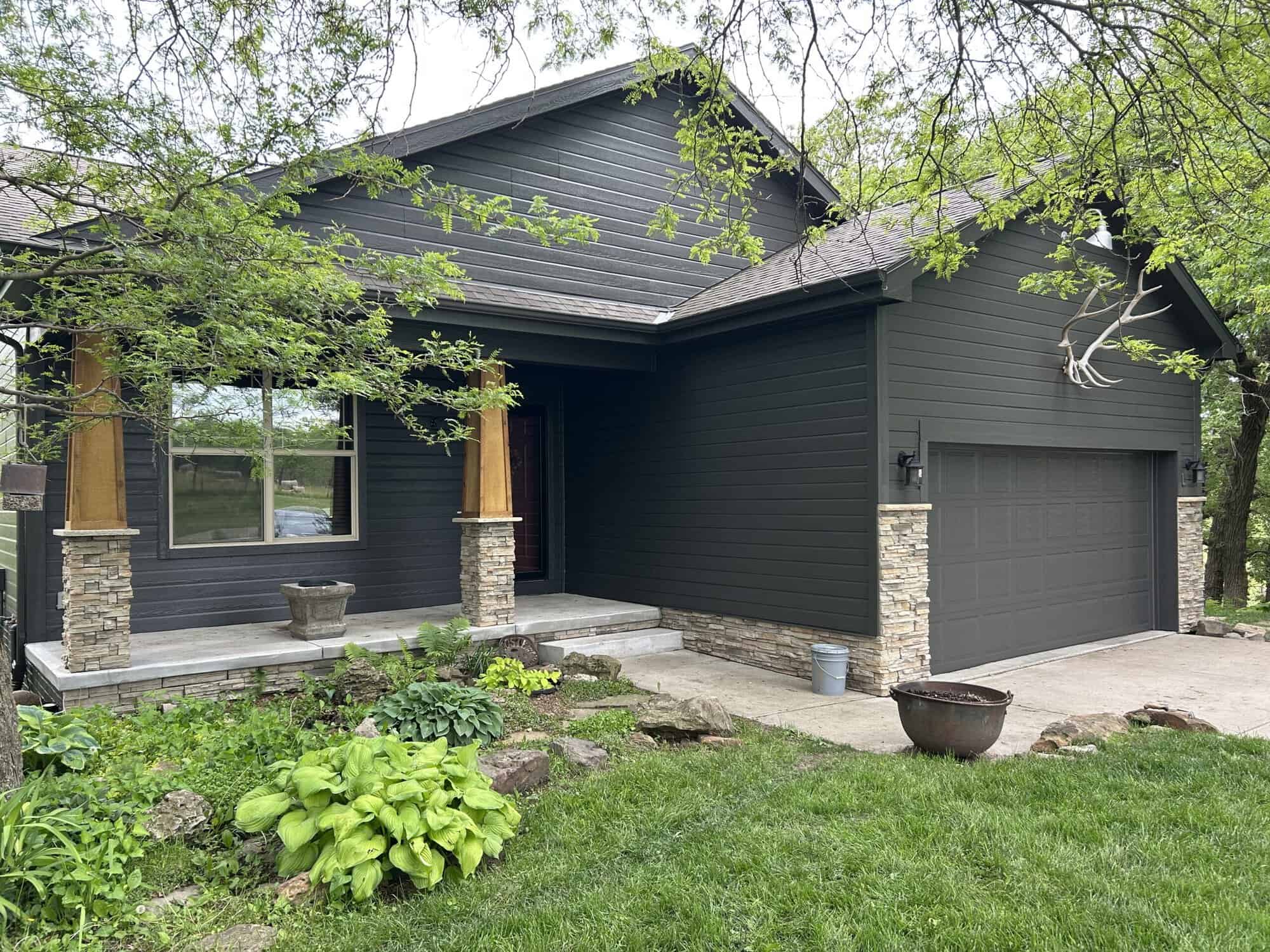 Media 4-623BC373-DDA0-4C08-824F-D9462B32774D Urbane Bronze Exterior Repaint With Garage and Gutters
